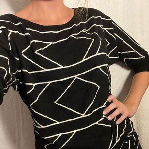 Comfy black and white sweater with designs